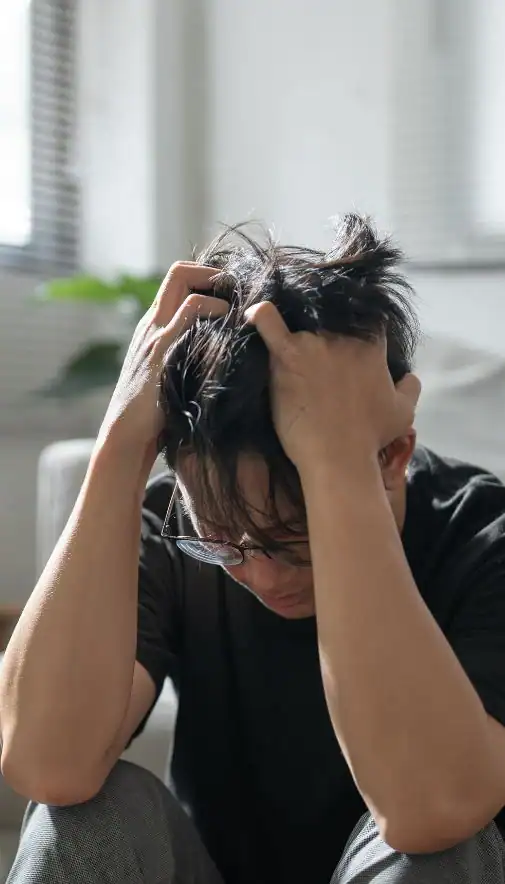 Image of upset man because of erectile dysfunction symptoms Cardiff